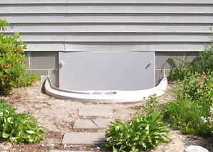 Rigid plastic crawl space access well installed in a Johnson City crawl space