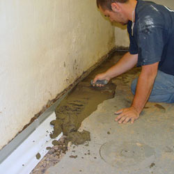 Testing a French drain system in a Hixson home.