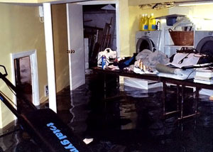 A laundry room flood in Elizabethton, KY, with several feet of water flooded in.