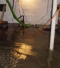 Several feet of floodwaters in a Manchester basement