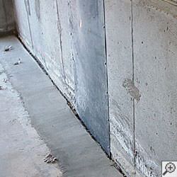 an ugly basement weeping tile drainage system that's clogged and not working in Maryville.