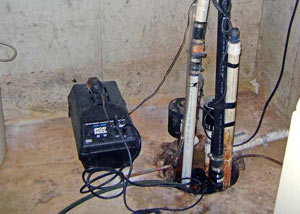 Pedestal sump pump system installed in a home in Powell